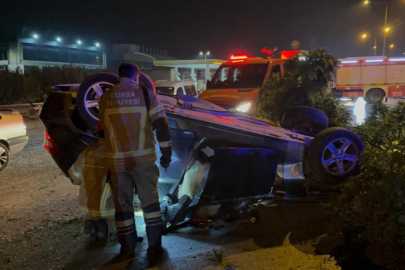 Bursa'da feci kaza: Önce ağaçları yıktı, sonra takla atarak karşı seride uçtu