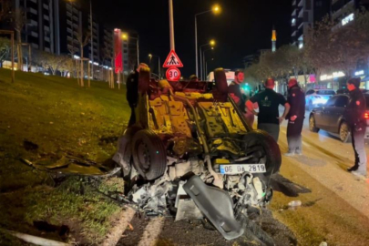 Bursa'da kontrolden çıkan otomobil refüje çarparak takla attı